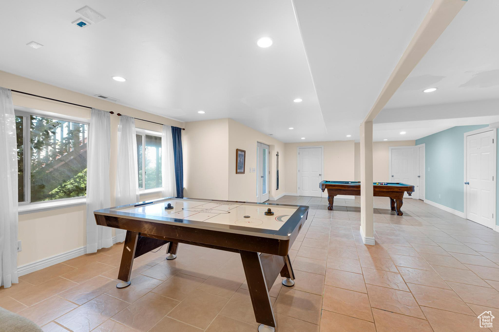 Recreation room featuring recessed lighting, pool table, and light tile patterned floors
