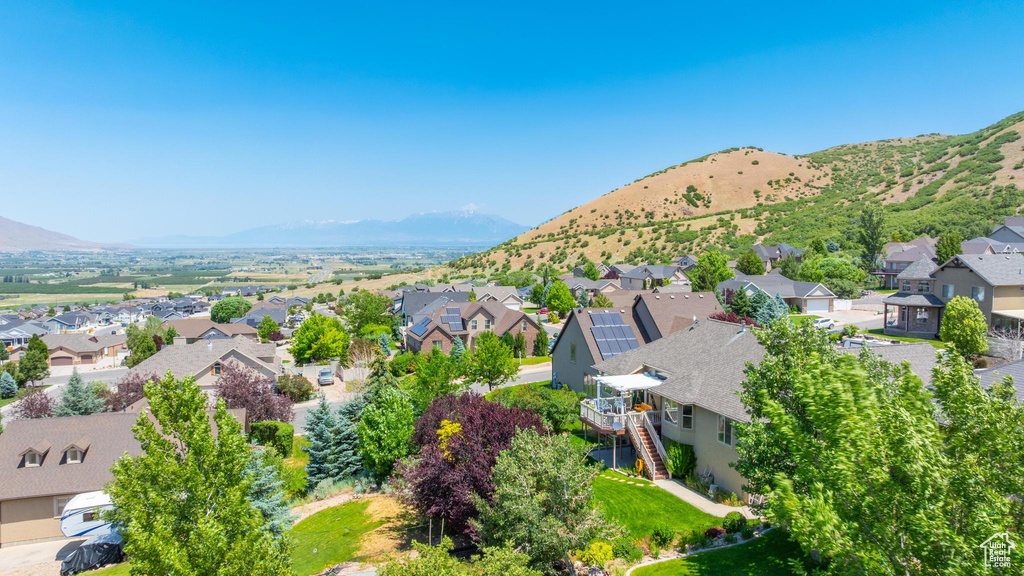 Aerial view of residential area with a mountain backdrop