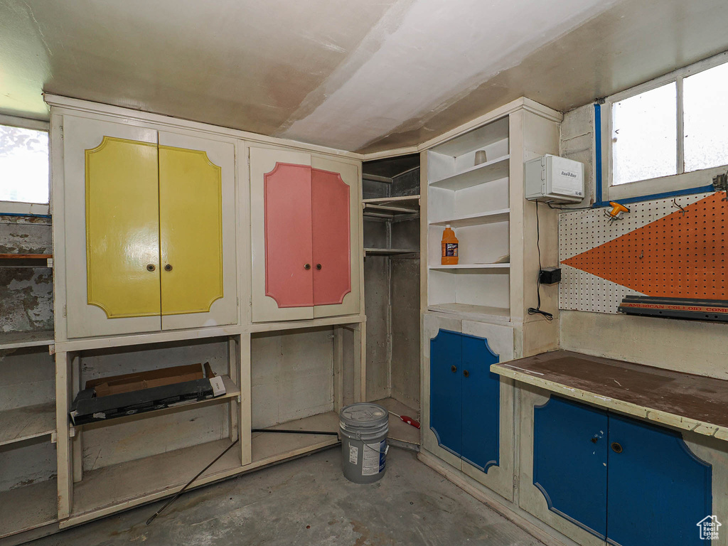 Miscellaneous room featuring concrete floors