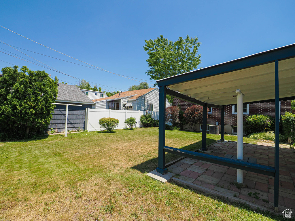 View of yard with a patio