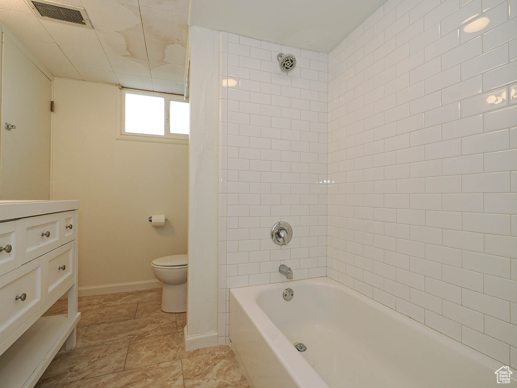 Full bathroom with vanity and shower / bath combination