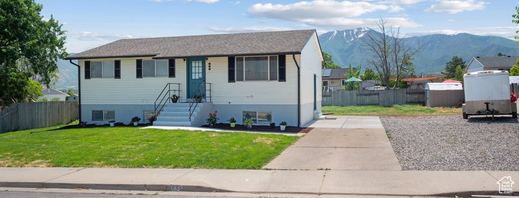 View of front of house with a mountain view