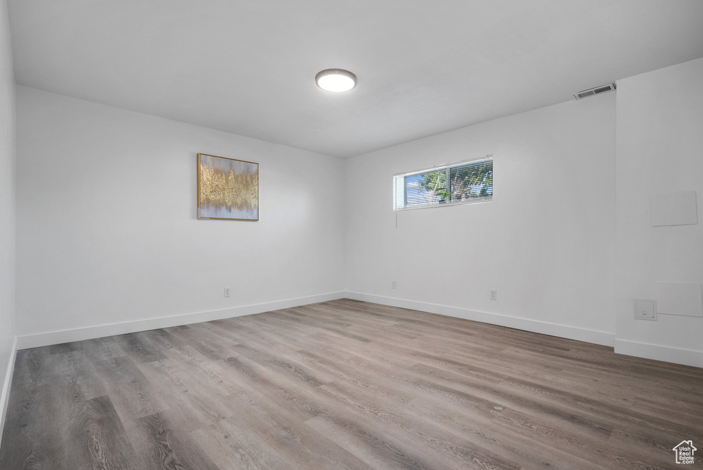 Empty room with wood finished floors