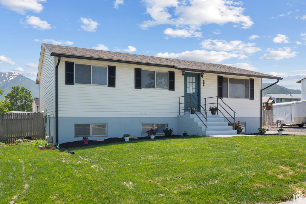 View of front of house with a mountain view