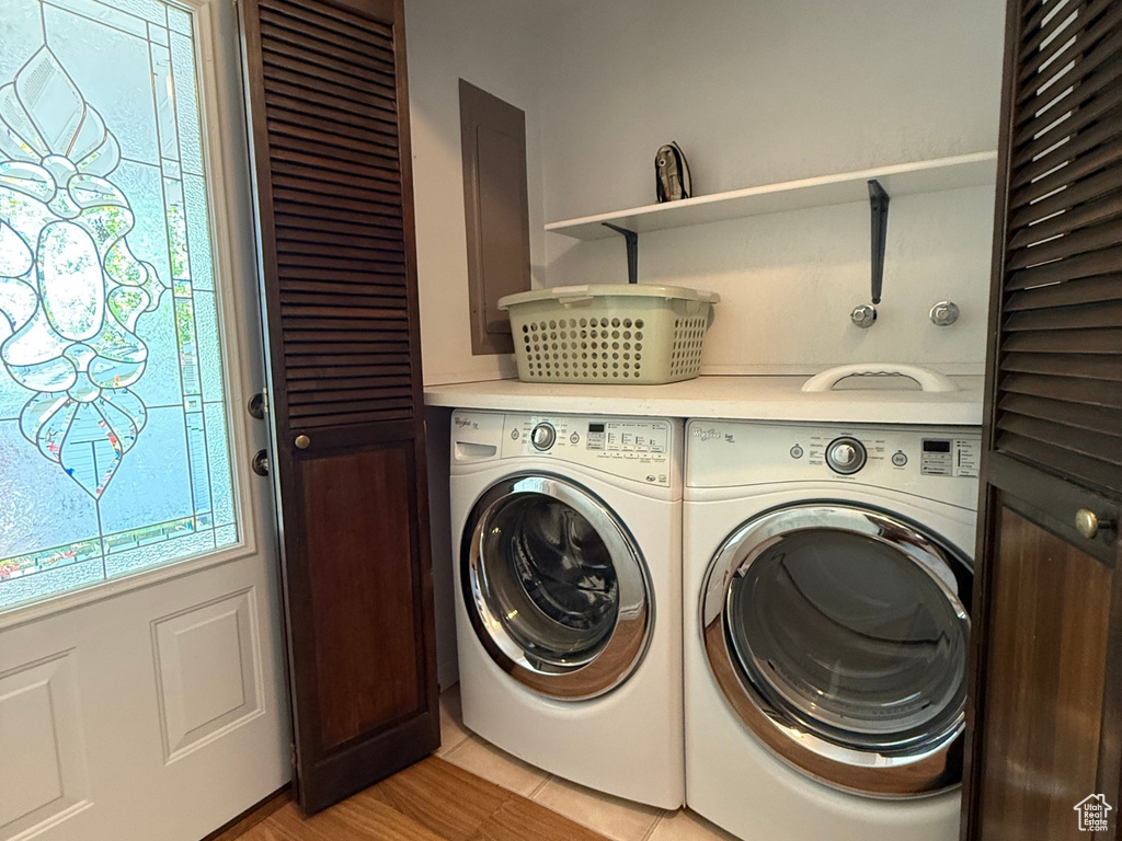 Laundry room featuring independent washer and dryer