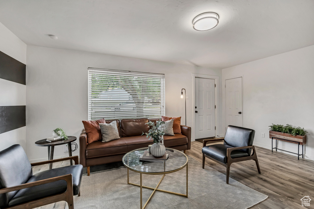 Living room featuring wood finished floors