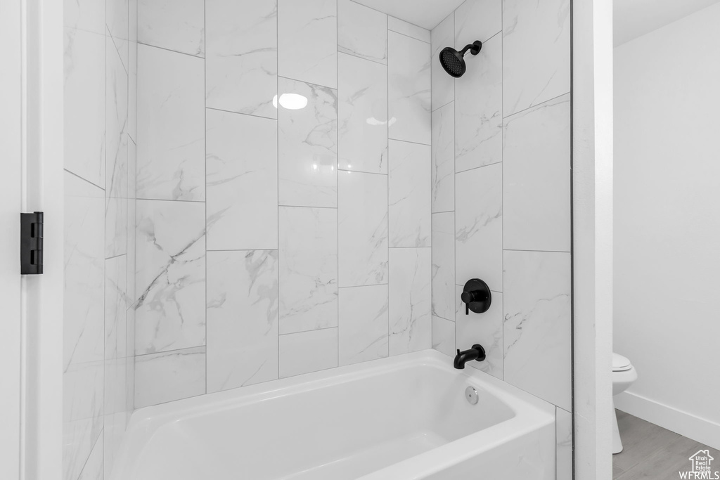 Bathroom with toilet and  shower combination