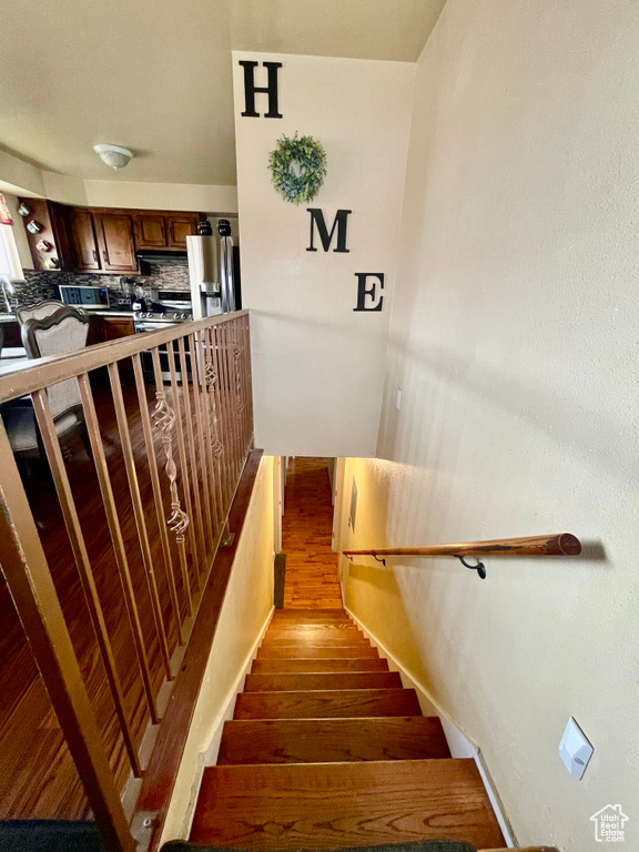 Stairway with wood finished floors