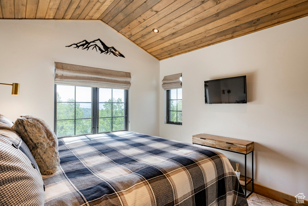 Bedroom featuring wooden ceiling, lofted ceiling, carpet flooring, and recessed lighting