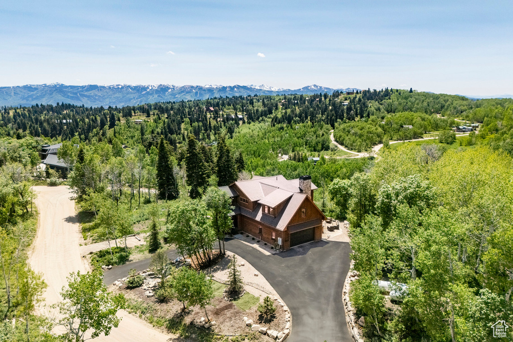 View from above of property with a mountainous background
