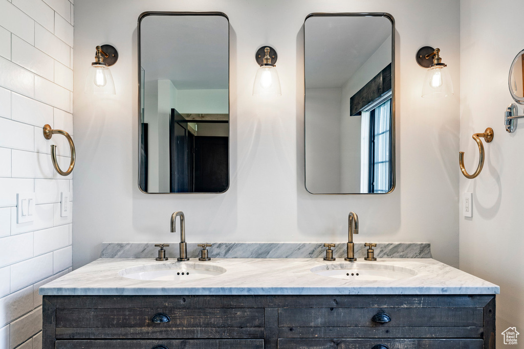Full bathroom with double vanity