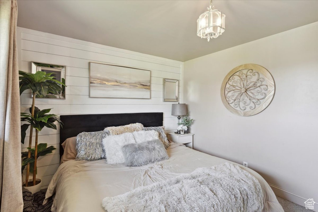 Bedroom with a chandelier