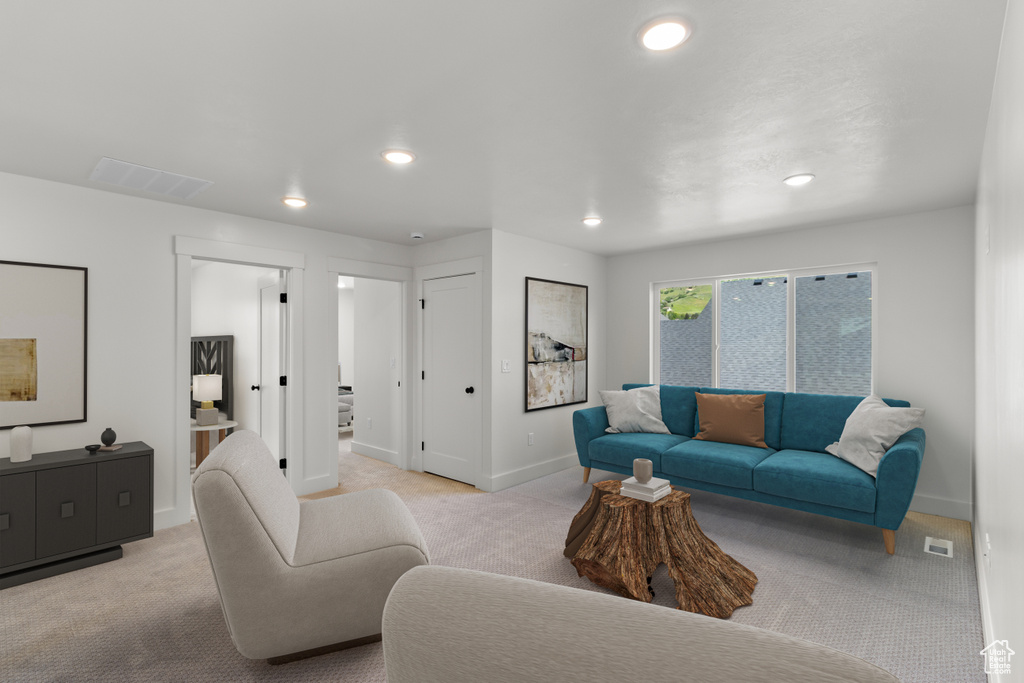 Living room with carpet floors and recessed lighting