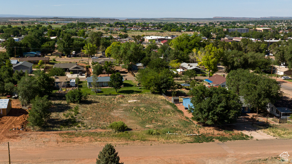 Aerial overview of property\'s location featuring nearby suburban area