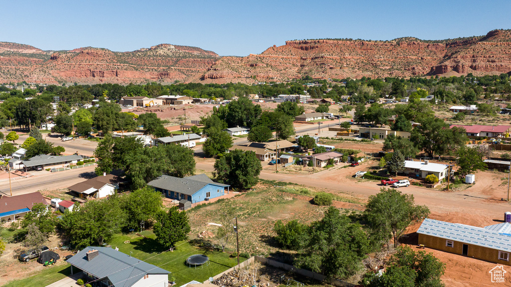 Aerial view of residential area featuring mountains