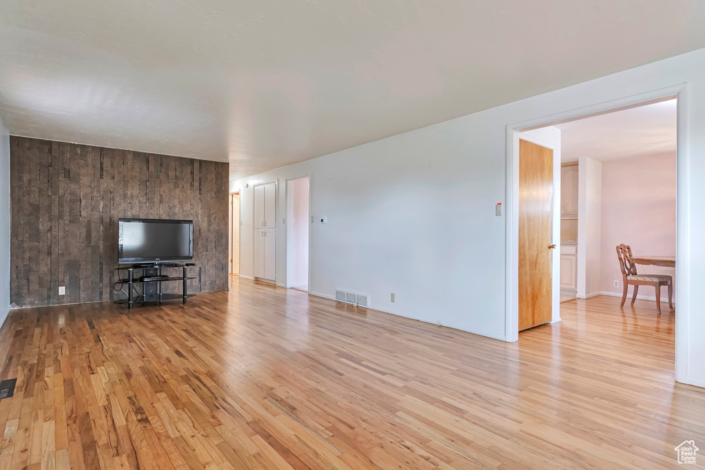 Living room featuring wood finished floors and baseboards