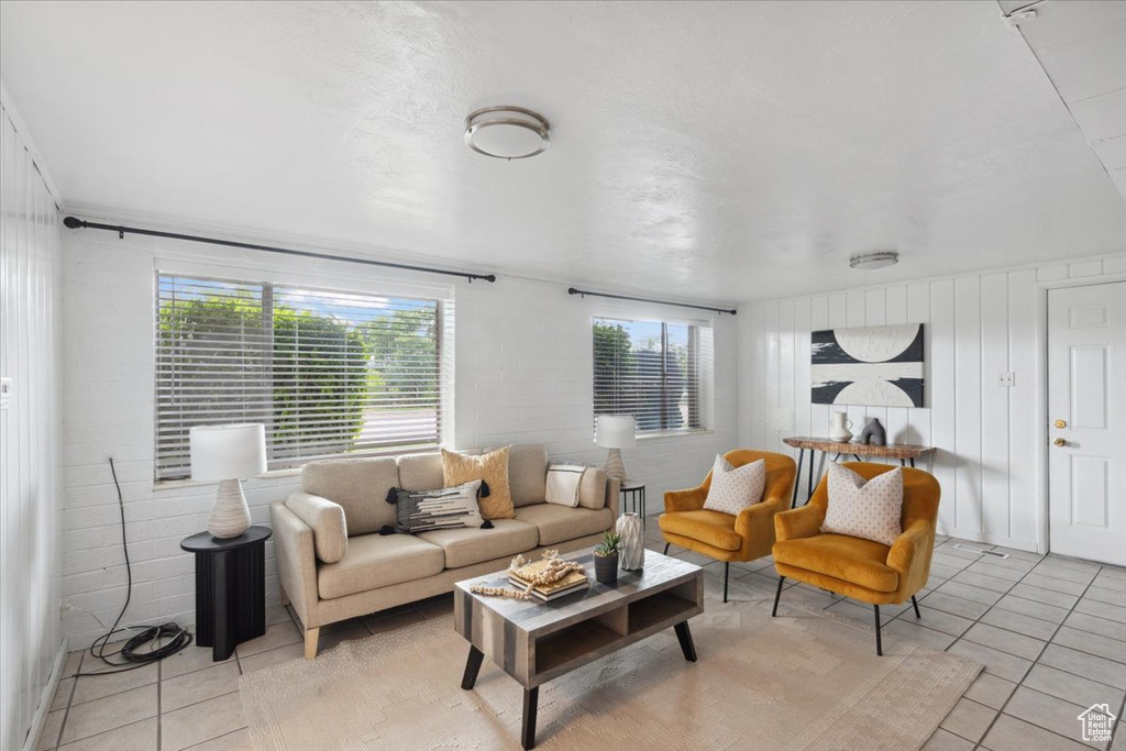 Living room featuring light tile patterned flooring