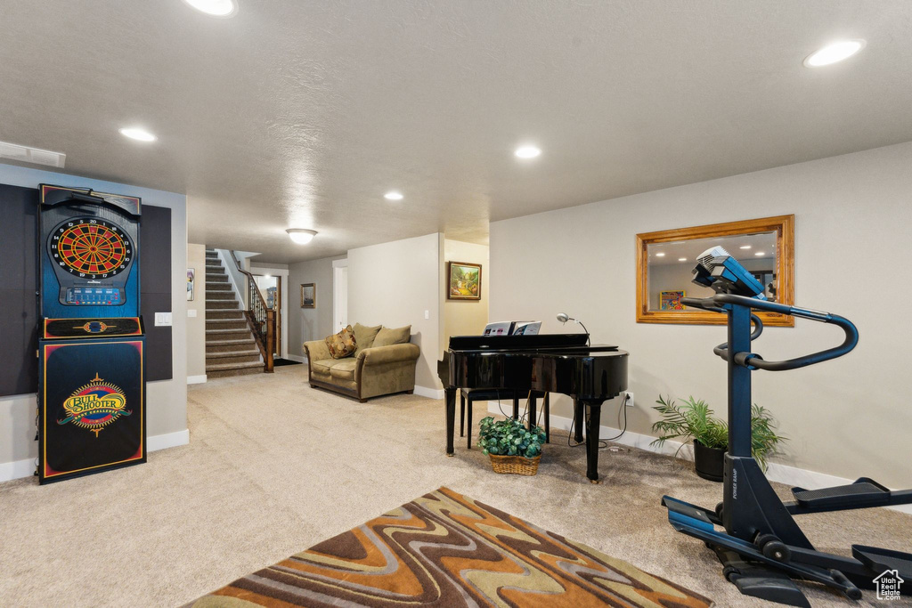 Exercise room featuring carpet flooring, recessed lighting, and baseboards