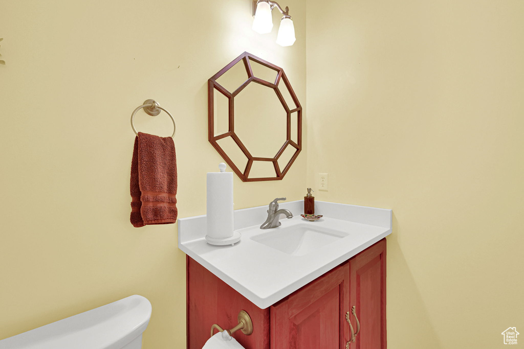 Bathroom with vanity and toilet