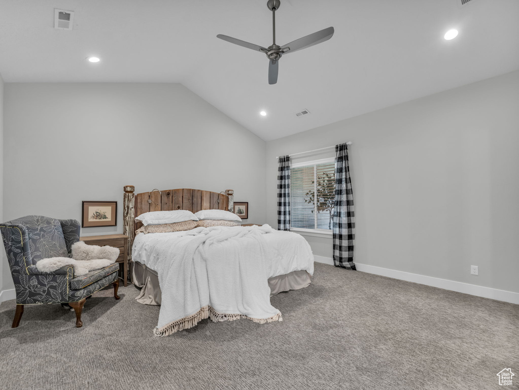 Carpeted bedroom featuring recessed lighting, vaulted ceiling, and a ceiling fan