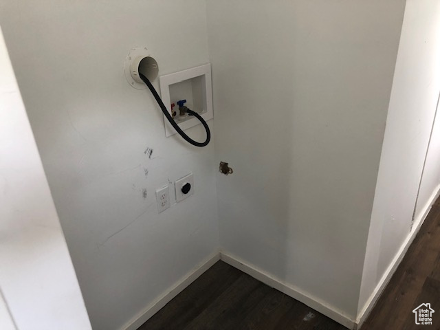 Laundry room featuring hookup for a washing machine, hookup for an electric dryer, and dark wood-style floors
