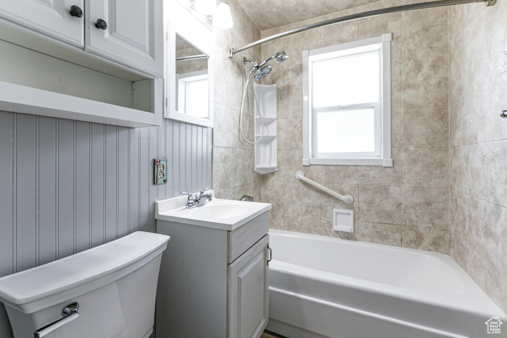Bathroom featuring shower / bath combination and vanity
