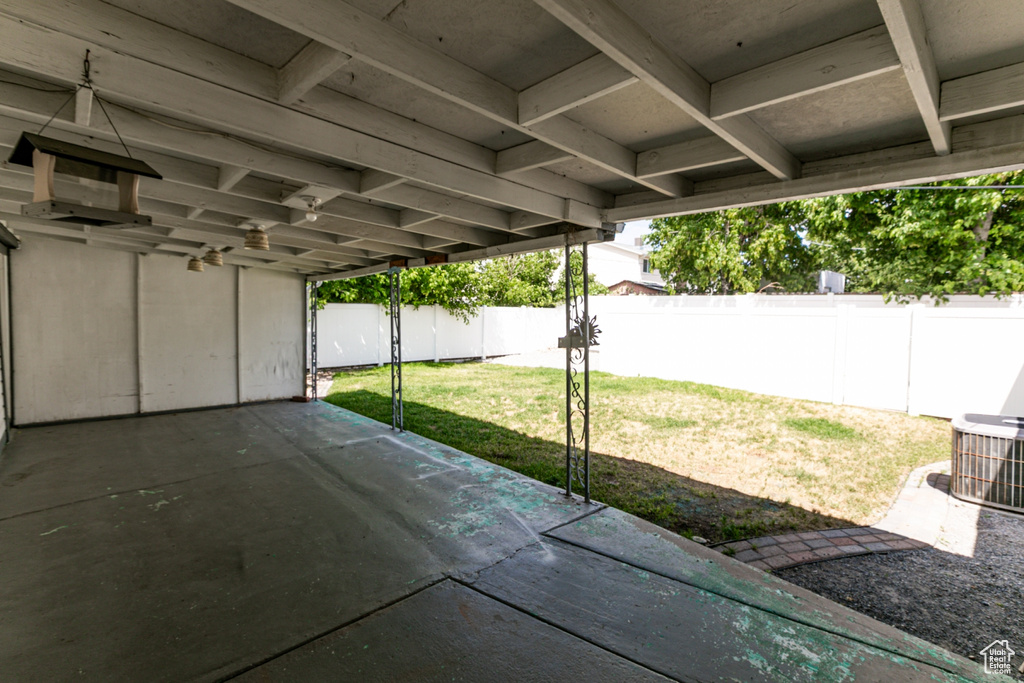 Fenced backyard featuring a patio