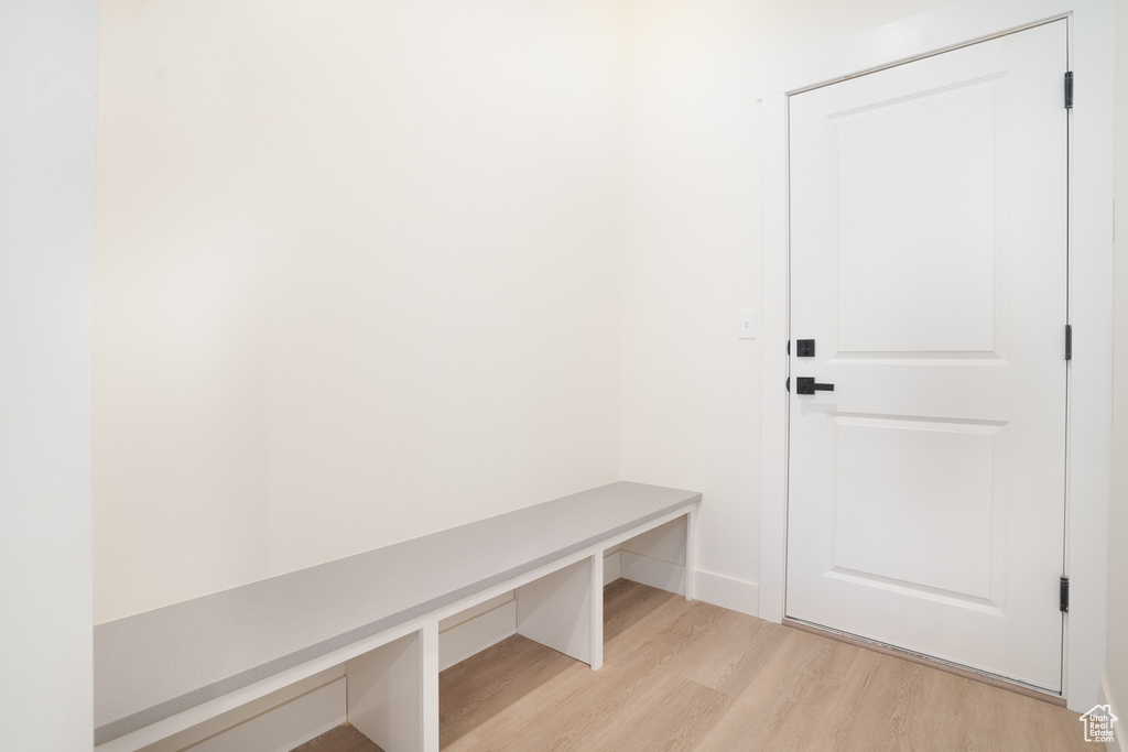 Mudroom featuring light wood-type flooring