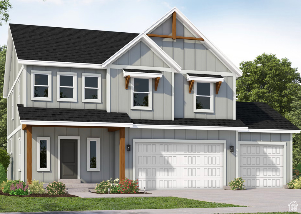 View of front facade with roof with shingles, board and batten siding, driveway, and a garage