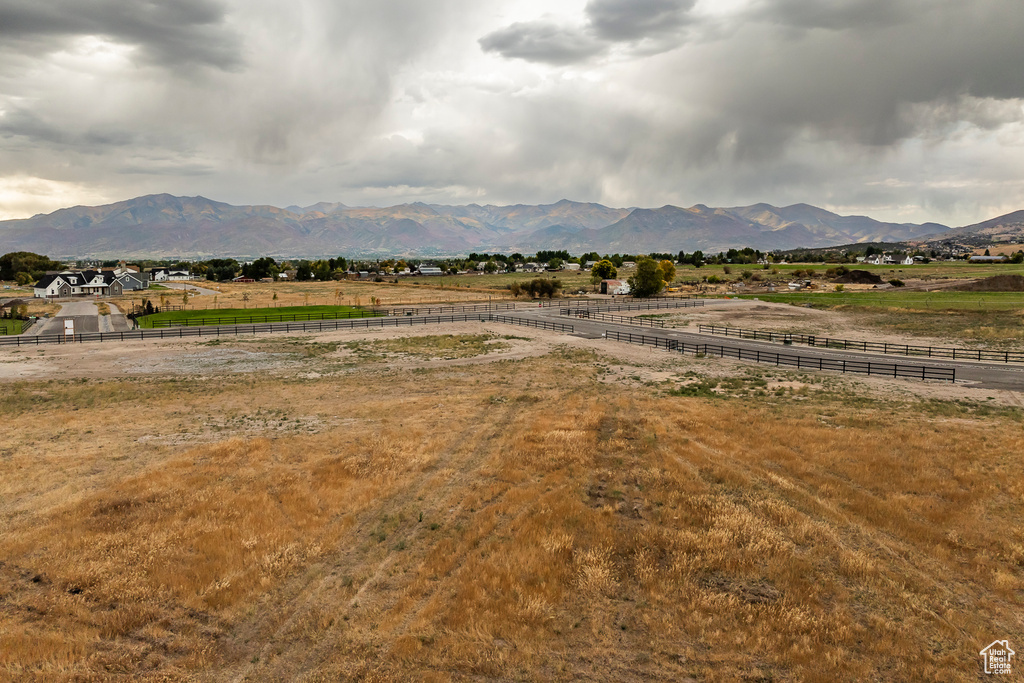 View of mountain background featuring rural landscape