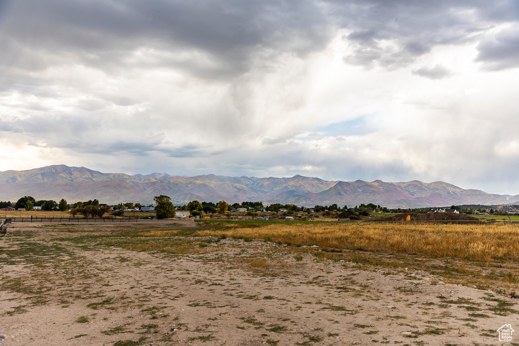 View of mountain backdrop featuring rural landscape