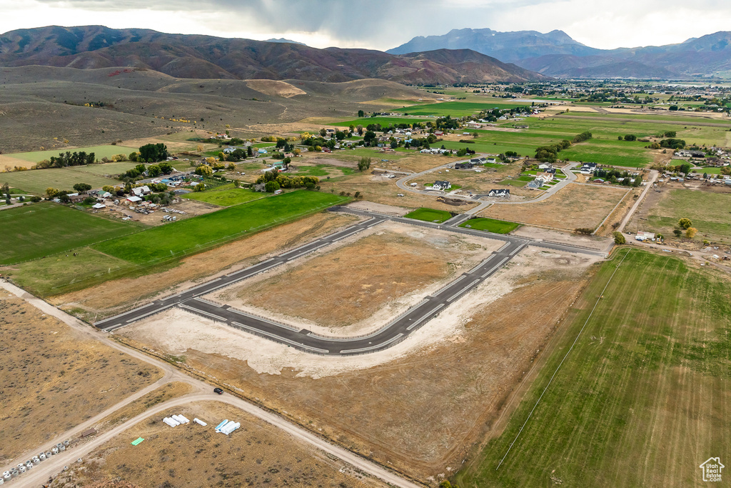 View of property location featuring mountains and rural landscape