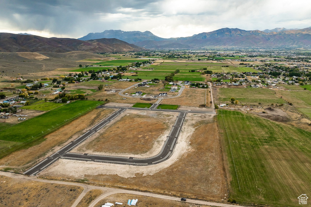 View of property location featuring mountains and rural landscape