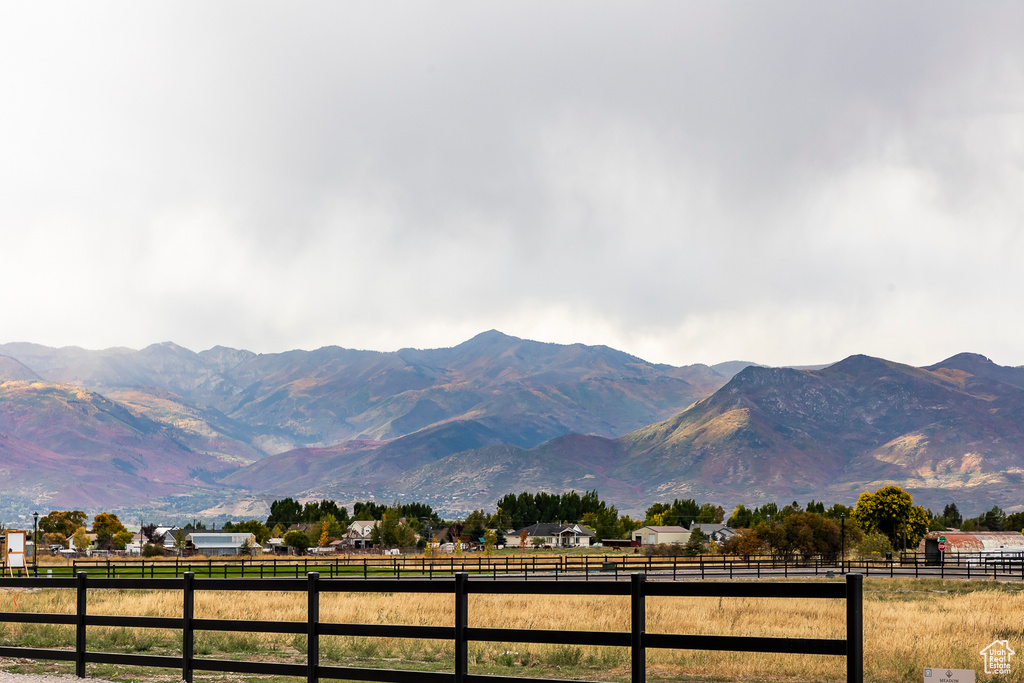 View of mountain backdrop featuring rural landscape