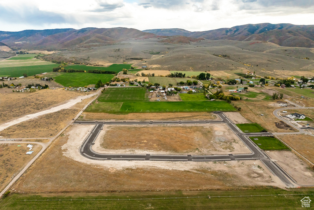 View of property location featuring mountains and rural landscape