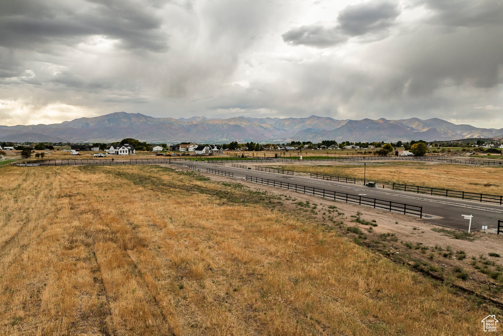 View of mountain background featuring rural landscape
