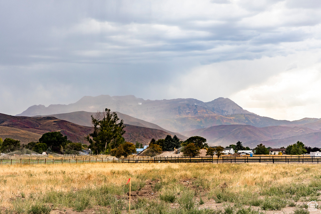 View of mountain backdrop featuring rural landscape