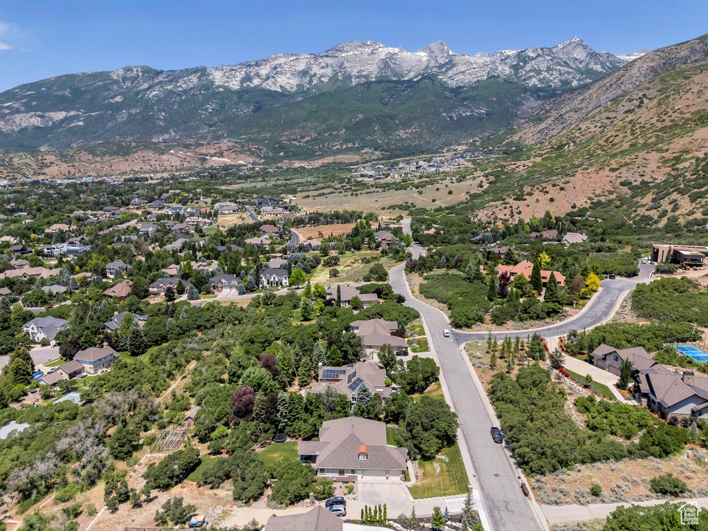 View of property location with mountains and nearby suburban area