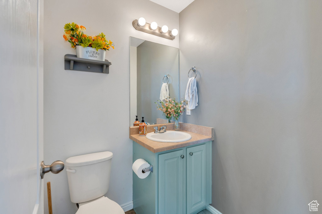 Bathroom with vanity and toilet