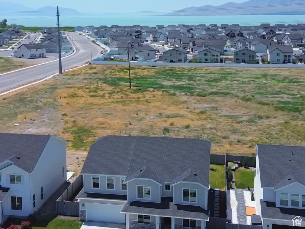 Aerial view of residential area with a mountain backdrop