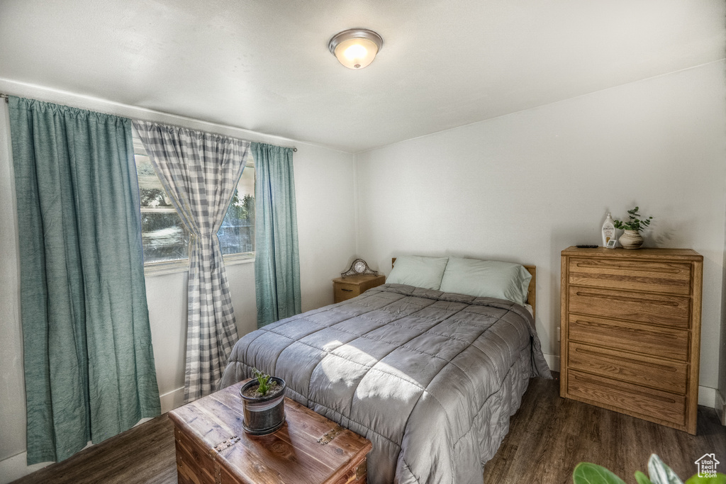 Bedroom featuring wood finished floors