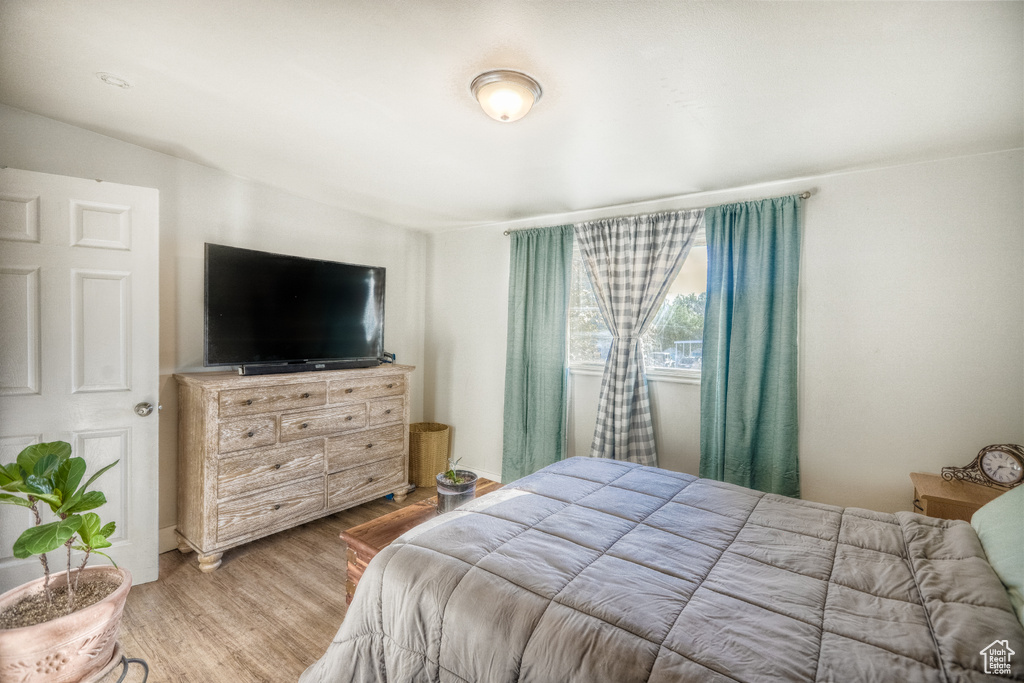 Bedroom featuring wood finished floors