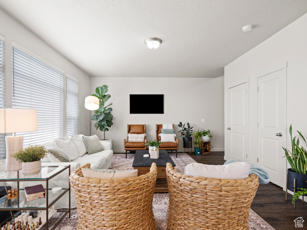 Living area with wood finished floors