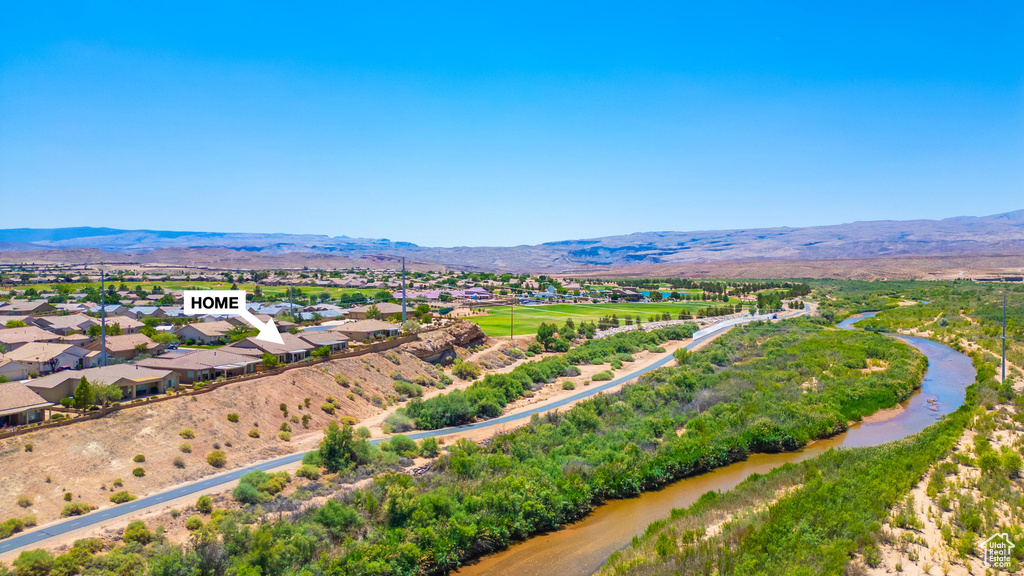 Aerial perspective of suburban area with mountains
