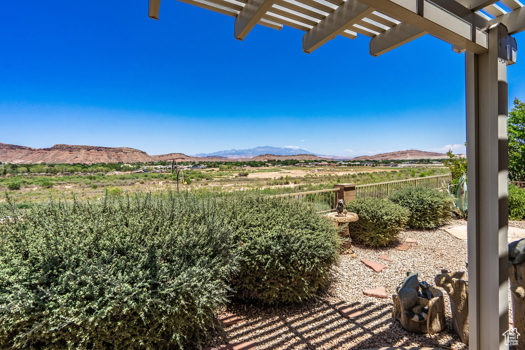 View of patio featuring a mountain view and a pergola