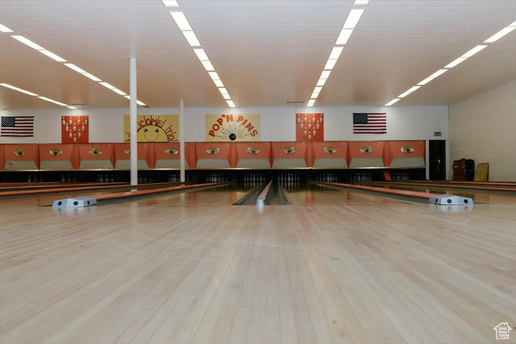Miscellaneous room featuring wood finished floors and a bowling alley