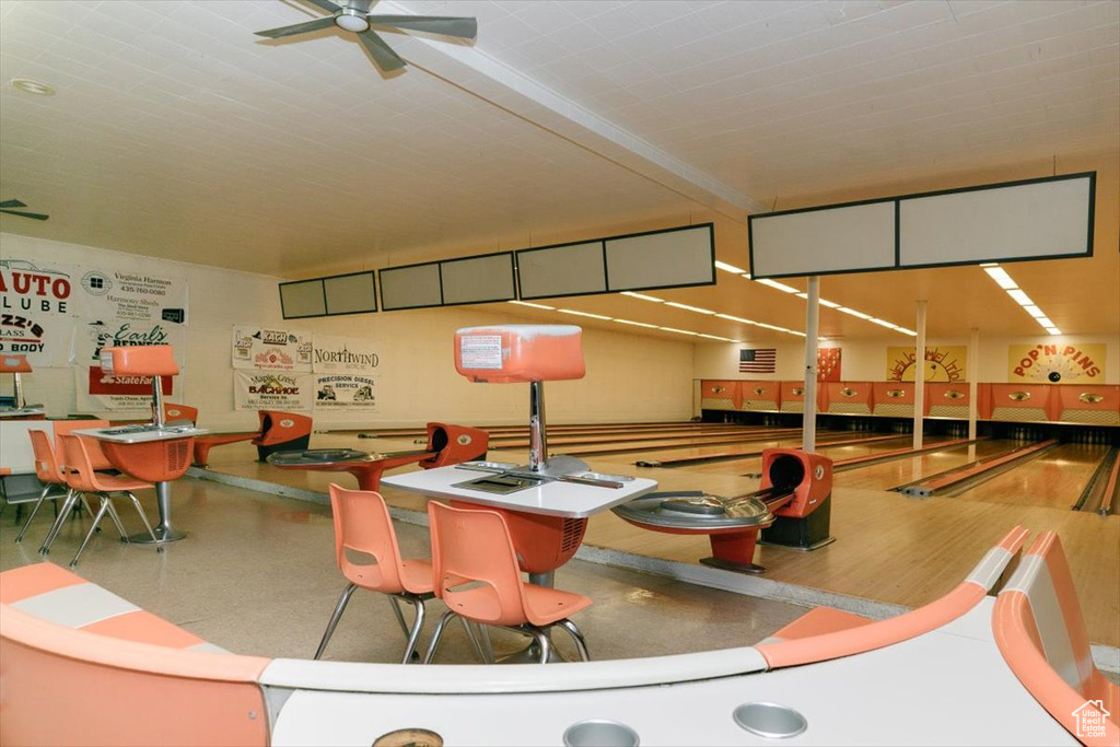 Playroom featuring a bowling alley and ceiling fan