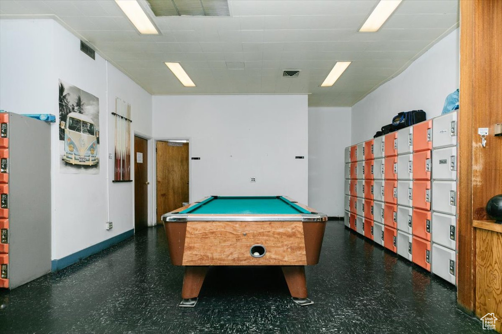 Recreation room with tile patterned floors and billiards table