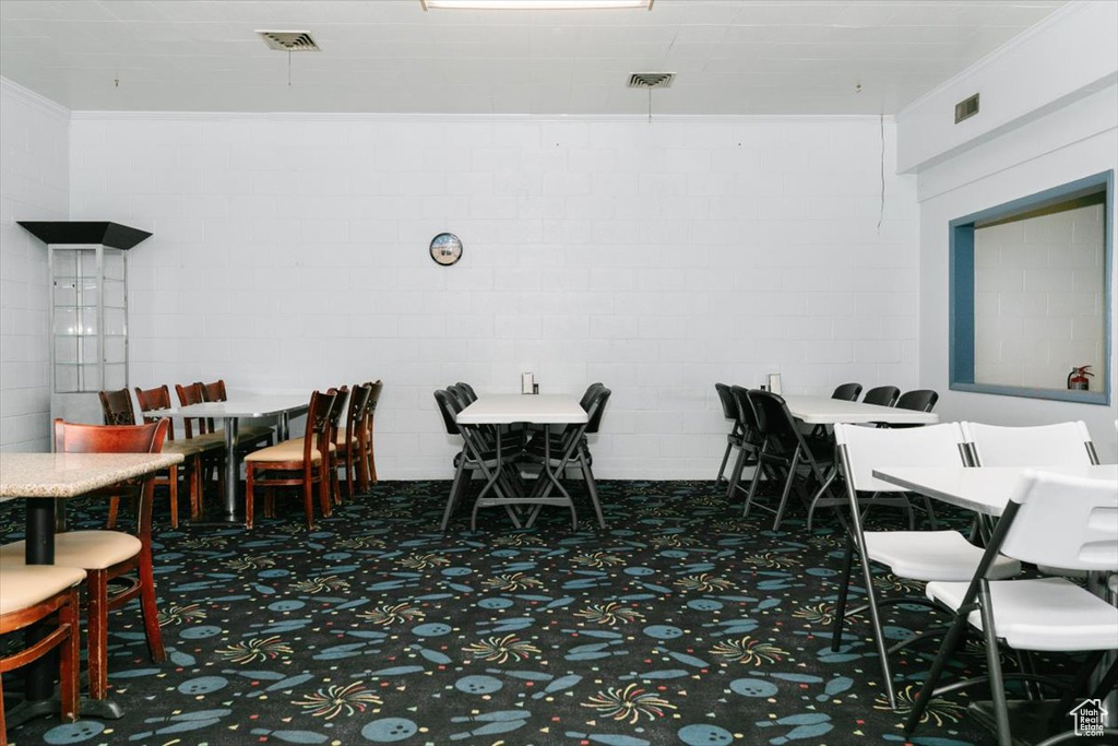View of carpeted dining room