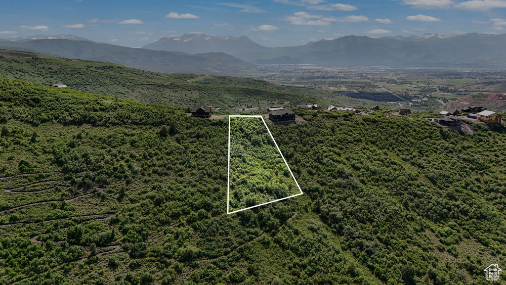View of property location with a mountain backdrop and property parcel outlined